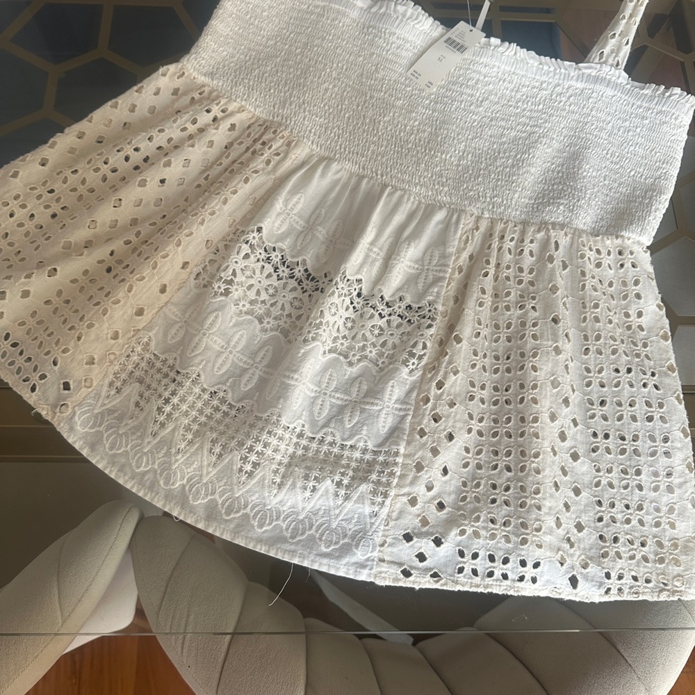 by Anthropologie delicate cream eyelet smocked camisole. NWT